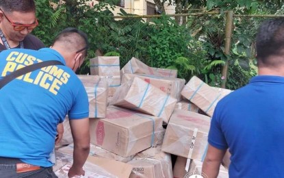 <p><strong>BUSTED.</strong> Customs officers account for the boxes containing smuggled cigarettes at a checkpoint in Davao City on Oct. 31, 2022. The Bureau of Customs also reported on Wednesday (Nov. 9, 2022) that the Port of Clark and PDEA also busted a shipment of kush or high-grade marijuana on Oct. 28. <em>(Photo courtesy of BOC)</em></p>