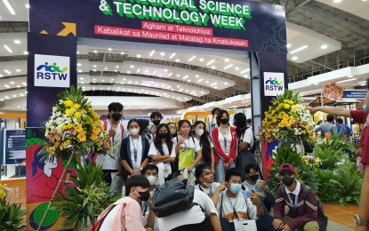 <p><strong>SCIENCE AND TECH WEEK</strong>. Students pose in front of the technology bazaar in Lingayen town, Pangasinan province n Nov. 9, during the opening of the 2022 Regional Science and Technology Week. The bazaar features different interactive exhibits. <em>(Photo by Hilda Austria)</em></p>