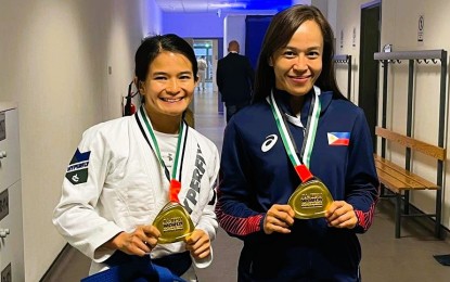 <p><strong>GOLD WINNERS</strong>: Margarita "Meggie" Ochoa (left) and Kimberly Anne Custodio show their medals after the awarding ceremony of the Ju-Jitsu World Championships in Abu Dhabi, United Arab Emirates on Nov. 3, 2022. The two prepare for the next international tournaments next year. <em>(Contributed photo)</em></p>
