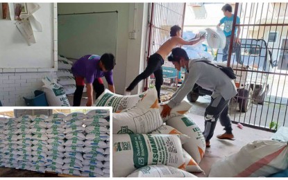 <p><strong>CONTINUING AID.</strong> Farmers affected by Severe Tropical Storm Paeng receive aid from the Bangsamoro Autonomous Region in Muslim Mindanao (BARMM) Ministry of Agriculture, Fisheries and Agrarian Reform as workers prepare more bags of rice seeds at its warehouse to be dispersed to agriculture stakeholders. BARMM agriculture officials said they have allotted 20,000 bags (inset) of rice seeds to affected farmers as of Wednesday (Nov. 9, 2022).<em> (Photos from Bangsamoro Information Office – BARMM)</em></p>