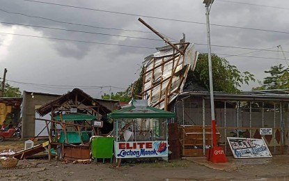 <p><strong>TORNADO</strong>. A strong, rotating column of wind during a heavy downpour in Ampatuan town, Maguindanao del Sur province, damaged homes and business establishments on Tuesday afternoon (Nov. 8, 2022). At least 20 structures were damaged during the 15-minute weather disturbance. <em>(Photo courtesy of Jacky Adatu Facebook account)</em></p>