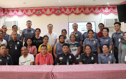<p class="p1"><span class="s1"><strong>SEALED AGREEMENT.</strong> Members of the San Isidro Sustainable Program Association and the Bureau of Jail Management and Penology pose for a photo following the signing of a marketing agreement for the long-term supply of vegetables to the prison facility. The agreement effectively cuts out middlemen in the purchase of vegetables for the facility, directly benefiting the farmers. <em>(Photo courtesy of BJMP-Kabacan)</em></span></p>