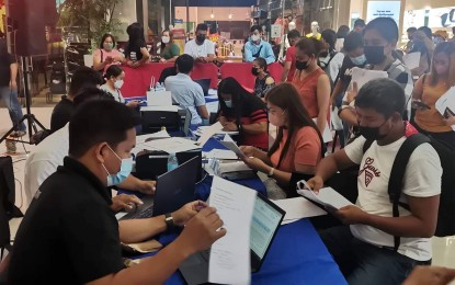 <p><strong>JOB FAIR</strong>. Ilocos Norte residents line up to apply for work at a job fair in this undated photo. On Nov. 12, 2022, around 6,000 jobs are up for grabs at the provincial government's year-end job fair to be held at Robinsons Ilocos. <em>(Photo courtesy of PESO Ilocos Norte)</em></p>