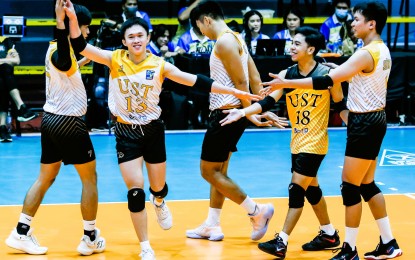 <p><strong>TRIUPHANT. </strong>University of Santo Tomas players celebrate their victory over Adamson University, 25-13, 27-25, 22-25, 25-19, in the 2022 V-League Men's Collegiate Challenge at the Paco Arena Sports and Events Center in Manila on Friday (Nov. 11, 2022). <em>(Photo courtesy of PVL Media Bureau)</em></p>