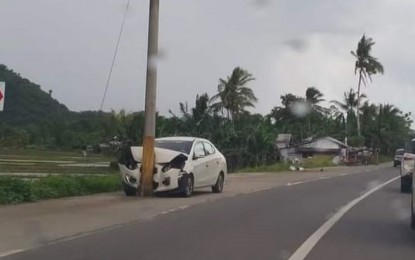 <p><strong>HAZARD</strong>. A car crashed into an electric post in Santa Fe town, Leyte province in this Aug. 2, 2022 photo. At least 8,376 electric poles are blocking widened roads in Eastern Visayas, posing danger to motorists, the Department of Public Works and Highways (DPWH) regional office in Tacloban City reported on Friday (Nov.11, 2022). <em>(Contributed photo)</em></p>
