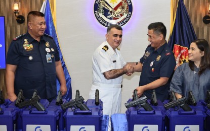 <p><strong>SUPPORT.</strong> Turkish military attachè to the Philippines Capt. Yavuz Mercan (center) shakes hands with PNP director for logistics Brig. Gen. Flynn Dongbo (2nd from right) during a courtesy visit to the PNP headquarters in Camp Crame on Nov. 3, 2022. Both sides affirmed their joint commitment to further bolster defense cooperation where Turkey has displayed a keen interest in supporting Philippine military modernization efforts. <em>(Photo courtesy of PNP)</em></p>