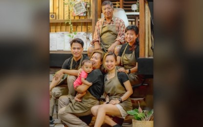 <p><strong>GUIDING LIGHT.</strong> The Gabay family runs a coffee shop at El Sur Place in Maddela town, Quirino province that is named after their deceased matriarch, Leonora, whose warmth and care is the guiding light in their business approach. Team Café Leonora is composed of the family patriarch, Feliciano (upper middle), Wensten (right), Gwyneth with her daughter (second from left), her husband Louie (left), and Kyrvy (second from right). <em>(Photo courtesy of Gabay Family)</em></p>