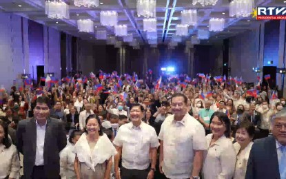 <p><strong>FILIPINO COMMUNITY</strong>. President Ferdinand R. Marcos Jr. meets with the Filipino community in Cambodia at the Hyatt Regency Phnom Penh in Cambodia on Sunday (Nov. 13, 2022). In his speech, Marcos said the Filipino workforce plays a crucial role in helping boost post-pandemic economic recovery in the Philippines. <em>(Screengrab from RTVM)</em></p>