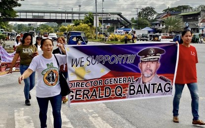 <p><strong>BACKERS.</strong> Supporters of suspended Bureau of Corrections chief-turned murder suspect Gerald Bantag hold a rally around the provincial capitol in Tabuk, Kalinga on Saturday (Nov. 12, 2022). The rallyists called for a fair trial for the city’s adopted son and the identification of the real perpetrators in the killing of broadcaster Percival Mabasa. <em>(Courtesy of Tabuk-PIO Facebook)</em></p>