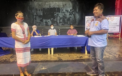 <p><strong>SELECTION OF IPMR</strong>. Cheryll Bromeo Tabangay and Lorenzo Agwarnak Padama, nominees for Indigenous Peoples Mandatory Representative (IPMR) to the Sangguniang Panlalawigan of Ilocos Norte, stand before the selection body on Tuesday (Nov. 15, 2022). Witnessing the selection process of the first IPMR in Ilocos Norte are Vice Governor Cecilia Araneta-Marcos, DILG provincial director Roger Daquioag and Ilocos Norte board member Franklin Respicio. <em>(PNA photo by Leilanie Adriano)</em></p>