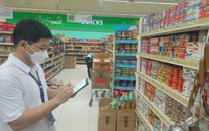 <p><strong>MONITORING</strong>. An employee of the Department of Trade and Industry (DTI) Antique Provincial Office monitors the prices of basic commodities at a major store on Nov. 11, 2022. DTI Antique officer- in-charge Lynna Joy Cardinal said Tuesday (Nov. 15) that the monitoring of the prices of basic and prime commodities in the province is now conducted daily. <em>(PNA photo courtesy of DTI Antique)</em></p>