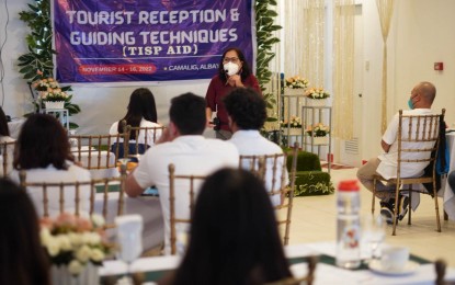 <p><strong>IMPROVING SERVICE</strong>. A trainer gives a lecture during the Tourist Reception and Guiding Technique Forum in Camalig town, Albay province on Tuesday (Nov. 15, 2022). The three-day training is being attended by hotel, restaurant, tourist attraction, and transport sector personnel.<em> (Photo from Camalig Mayor Caloy Baldo's Facebook page)</em></p>