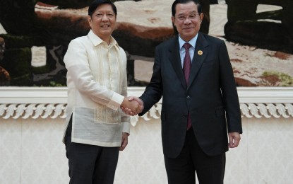 <p><strong>COOPERATION.</strong> President Ferdinand R. Marcos Jr. (left) and Cambodian Prime Minister Hun Sen shake hands after holding a bilateral meeting on the sidelines of the 40th and 41stSEAN Summit and Related Summits in Phnom Penh, Cambodia on Thursday (Nov. 10, 2022). The Cambodian official contracted Covid-19 after the summit. <em>(Courtesy of the Office of the Press Secretary)</em></p>