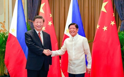 <p><strong>'PLEASANT EXCHANGE'. </strong>President Ferdinand R. Marcos Jr. (right) Chinese President Xi Jinping (left) on Thursday (Nov. 17, 2022) discuss the former's upcoming state visit to China and other regional issues during their bilateral meeting at the sidelines of the 29th Asia-Pacific Economic Cooperation (APEC) Leaders Meeting in Bangkok, Thailand. They both agreed to hold more bilateral talks to have a more comprehensive discussion of regional and global issues.<em> (Photo courtesy of Bongbong Marcos Facebook page) </em></p>