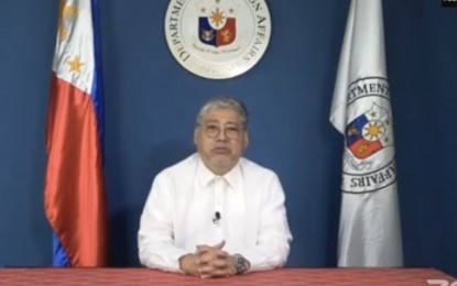 <p>DFA Secretary Enrique Manalo <em>(Screengrab from Zoom seminar)</em></p>