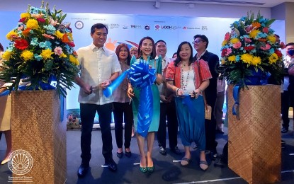 <p><strong>TRAVEL FAIR</strong>. Department of Tourism (DOT) Secretary Christina Garcia Frasco (center) leads the opening of the first-ever North Luzon Travel Fair at SMX Convention Center in Clark, Pampanga on Friday (Nov. 18, 2022). The event carries the theme "Weaving our way to Recovery". <em>(Photo courtesy of the Department of Tourism)</em></p>