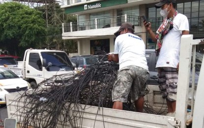 <p>REMOVED. Some of the old entangled wires cleared from the major roads of Bacolod City on the first week of November. These are part of the 44 tons of “spaghetti” wires removed from July to November this year in line with the directive of Mayor Alfredo Abelardo Benitez to clear the hazards and nuisance in public pathways. <em>(Photo courtesy of Bacolod City PIO)</em></p>
<p> </p>