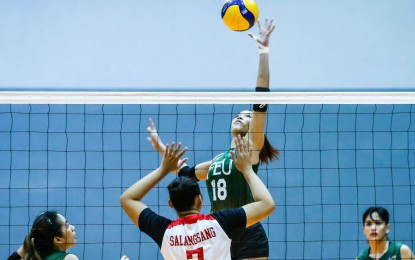 <p><strong>BEST SCORER.</strong> Mitzi Panangin of Far Eastern University (No. 18) against Francesca Salangsang of San Beda University during the classification round match in the V-League Collegiate Challenge held at the Paco Arena in Manila on Friday (Nov. 18, 2022). Panangin scored 11 points to lead the Lady Tamaraws to victory, 25-17, 25-16, 25-19. <em>(Photo courtesy of PVL Media Bureau)</em> </p>