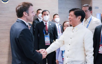 <p><strong>EXPANDED COOPERATION.</strong> President Ferdinand R. Marcos Jr. (right) and French President Emmanuel Macron meet on the sidelines of the 29th Asia-Pacific Economic Cooperation (APEC) Leaders’ Meeting in Bangkok, Thailand on Nov. 18, 2022. During their bilateral meeting, the two leaders agreed to further elevate the Philippines’ and France’s relations by expanding cooperation in key areas, such as agriculture, energy and defense. <em>(Photo courtesy of the Office of the President)</em></p>