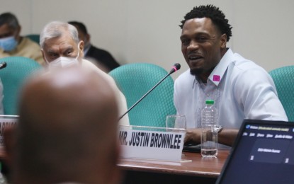 <p><strong>ALMOST FILIPINO.</strong> Barangay Ginebra resident import Justin Brownlee is all smiles as the Senate Committee on Justice and Human Rights concludes its proceedings on his naturalization bid on Monday (Nov. 21, 2022). Brownlee may secure the approval of the Senate by December. <em>(PNA photo by Avito C. Dalan)</em></p>