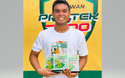 <p><strong>DOUBLE CHAMPION</strong>. Unseeded Miguel Iglupas emerges double champion in the Philippine Columbian Association (PCA) Juniors National Tennis Championships at the PCA outdoor shell courts in Plaza Dilao, Paco, Manila on Monday (Nov. 21, 2022). Iglupas won the boys' 18-under and 16-under titles and was adjudged Most Valuable Player. <em>(Contributed photo)</em></p>