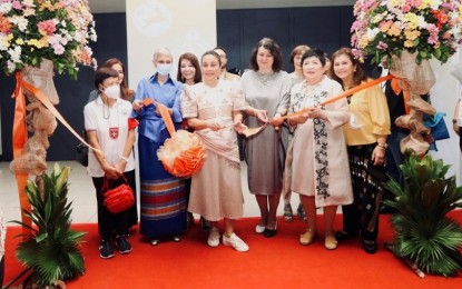 <p><strong>INT'L BAZAAR.</strong> Senator Loren Legarda (3rd from left, front row); Pamela Louise Manalo, IBF chairperson (2nd from left, front row); and Riitta Laakso, SHOM President (4th from left, front row) led the ribbon-cutting ceremony to officially open the International Bazaar 2022 on Sunday (Nov. 21, 2022). The Department of Foreign Affairs said the event generated at least 4,598 in foot traffic.<em> (Photo courtesy of DFA)</em></p>