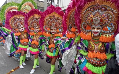 <p><strong>MASSKARA FESTIVAL</strong>. A group of street dance performers in the 2022 MassKara Festival. For this year’s 44th edition, hotels and other accommodation establishments in Bacolod City are already fully booked for the festival highlights from Oct. 19 to 22.(<em>PNA Bacolod file photo</em>)</p>