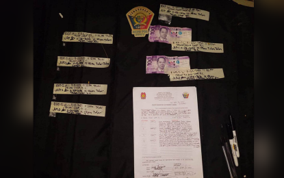 <p><strong>FORMER COPS.</strong> Operatives of the Zamboanga City Police Office's Station 6 arrest two former police officers in an anti-drug operation in Barangay Talon-Talon, Zamboanga City on Tuesday (Nov. 22, 2022). One of the suspects is allegedly a member of a local drug syndicate while the other is a newly-identified drug personality. <em>(Photo courtesy of ZCPO)</em></p>