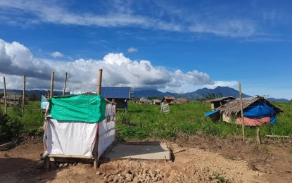 <p><strong>INFORMAL SETTLERS</strong>. Some 337 informal settlers are occupying a private property in Barangay Napacao, Siaton in Negros Oriental. Gov. Roel Degamo and other officials said during a peace dialogue on Wednesday (Nov. 23, 2022) that they will find a government land where these farmers could relocate.<em> (Photo by Judy Flores Partlow)</em></p>