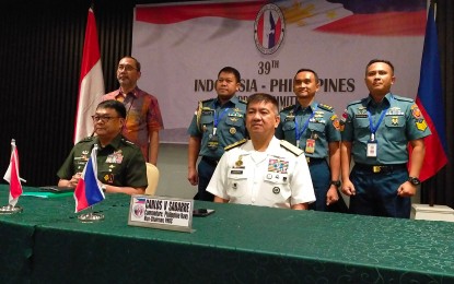 <p><strong>BORDER TIES.</strong> Lt. Gen. Greg Almerol (sitting left), commander of Eastern Mindanao Command (Eastmincom) and chairperson of the Philippine Border Committee, and Rear Admiral Dr. TSNB Hutabarat MMS (sitting right), head of the Indonesian Navy's 2nd Fleet Command and Indonesian Border Committee (IDBC), issue a joint statement in Davao City Friday (Dec. 16, 2022). Both officials emphasized the need for more sea border patrols in 2023 to enhance security in the maritime borders of both countries. <em>(PNA photo by Robinson Niñal Jr.)</em></p>
