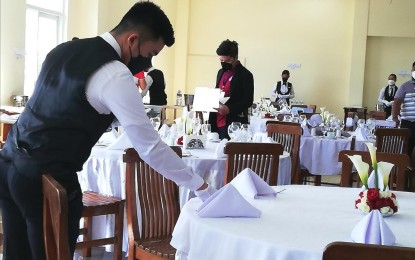 <p><strong>UPSKILLING.</strong> The Technical Education and Skills Development Authority provides free skills training to Filipinos to increase the employability of the public like these scholars who are trained in food and beverage services in this undated photo. The City Tourism Office said the demand for workers in the tourism industry has increased, especially with the reopening and opening of new tourism establishments. <em>(PNA photo by Liza T. Agoot)</em></p>