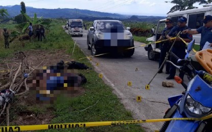 <p><strong>AMBUSHED</strong>. Crime scene investigators of Sipalay City Police Station secure the area where they found the bodies of two soldiers gunned down by suspected New People's Army rebels in Barangay Camindangan, Sipalay City, Negros Occidental on Thursday (Nov. 24, 2022). Killed were intelligence operatives of the Philippine Army’s 47th Infantry Battalion based in Barangay Haba in the neighboring Candoni town.<em> (Photo courtesy of Negros Occidental Police Provincial Office)</em></p>