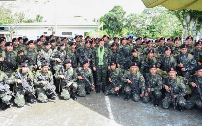 <p><strong>NEW SAF COMMANDOS.</strong> The 116 new members of the PNP Special Action Force pose for a photo with PNP chief Gen. Rodolfo Azurin Jr. during their training completion rites in Tigaon, Camarines Sur on Nov. 21. The SAF Commando Class 113-2021 is also known as the ADMIRALS or Alliance of the Defender of Mother Land Imbued with Respect for the Almighty, Love Of Country, and Selfless services. <em>(Photo courtesy of PNP)</em></p>