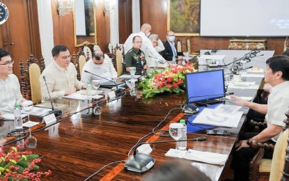 <p><strong>DEFENSE AGENDA</strong>. President Ferdinand R. Marcos Jr. meets with the officials of the Department of National Defense (DND) at the State Dining Room of Malacañang Palace on Tuesday (Nov. 29, 2022). During the meeting, DND officer-in-charge Undersecretary Jose Faustino Jr. presented the department's 10-point defense agenda which aims to align its policies with Marcos' promise of a stronger and better Philippines. <em>(Photo courtesy of the Office of the President)</em></p>