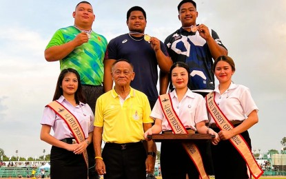 <p><strong>GOLD WINNER</strong>: John Albert Mantua of the Philippines (center, back row) holds his gold medal during the men's shot put awarding ceremony at the Thailand Open Track and Field Championships on Nov. 28, 2022. The Philippines has already won three gold medals. <em>(Contributed photo)</em></p>