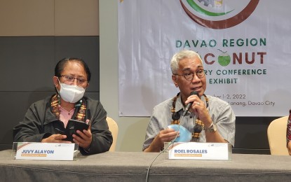 <p><strong>COCO LEVY.</strong> Roel Rosales (right), the deputy administrator of the Philippine Coconut Authority in Davao Region (PCA-11), says during a press conference in Davao City Thursday (Dec. 1, 2022) that some PHP250 million worth of intervention is allotted to the Davao Region coconut farmers as startup services. The amount is sourced from the Coconut Farmers and Industry Development Program fund worth PHP5 billion. <em>(PNA photo by Che Palicte)</em></p>