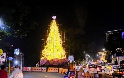 <p><strong>CHRISTMAS FESTIVITIES.</strong> The Baguio City government tests the lighting system of the giant Christmas tree on Session Road Wednesday (Nov. 30, 2022) to assure its readiness for the formal lighting event on Dec. 1. The lighting of the giant Christmas, which will be followed by the resumption of the Saint Louis University lantern parade, marks the opening of the city’s annual Christmas festivities. <em>(PNA photo courtesy of PIO-Baguio)</em></p>