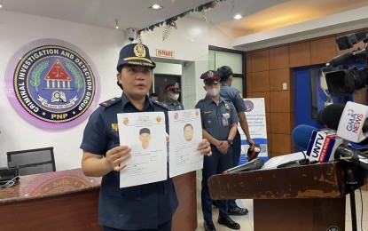 <p><strong>UNMASKED.</strong> CIDG spokesperson Maj. Mae Ann Cunanan shows the composite sketches of two suspects in the case of missing sabungeros in a press briefing at Camp Crame on Thursday (Dec. 1, 2022). The composite sketches were based on a raw cellphone video obtained by the CIDG which showed two men and a handcuffed missing sabungero walking outside a cockfighting arena in Santa Cruz, Laguna on April 28, 2021. <em>(Photo courtesy of CIDG)</em></p>