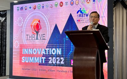 <p><strong>INNOVATION SUMMIT.</strong> DOST Regional Director Julius Caesar Sicat delivers his message during the 2022 THRIVE Central Luzon Innovation Summit at The Orchids Garden, City of San Fernando, Pampanga on Thursday (Dec. 1, 2022). The event is to enable the matching, adoption or commercialization of locally-generated innovations and technologies from the R&D institutions to the interested MSMEs. <em>(Photo courtesy of DOST Region III)</em></p>