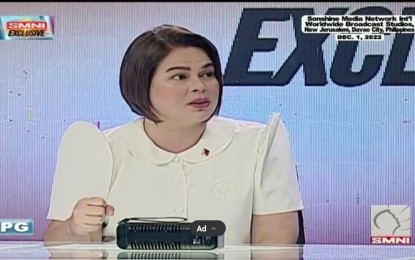 <p><strong><span data-preserver-spaces="true">ADDRESSING DISCONNECTION.</span></strong> Vice President Sara Duterte joins Pastor Apollo Quiboloy in an exclusive interview with the Sonshine Media Network International (SMNI) on Thursday (Dec. 1, 2022). She said she's working on addressing the disconnection between the education department’s central and regional offices to improve the implementation of programs on the ground.<strong><span data-preserver-spaces="true"> </span></strong><em><span data-preserver-spaces="true">(Screengrab) </span></em></p>