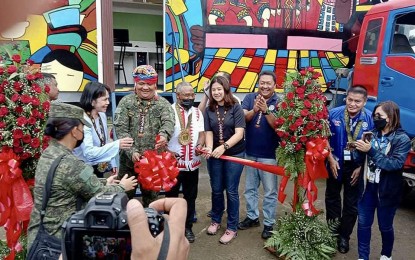<p><strong>COMPUTER EDUCATION.</strong> Agusan del Norte Gov. Maria Angelica Amante (2nd left), together with Brig. Gen. Adonis Ariel Orio, the Army’s 402nd Infantry Brigade commander (3rd left), Mayor Karen Rosales (5th left), and TESDA Agusan del Norte Director Rey Cueva (6th from left) lead the opening of the Mobile Computer Laboratory (MCL) Van on Thursday (Dec. 1, 2022) in Barangay Lawan-Lawan, Las Nieves, Agusan del Norte. The MCL van is expected to benefit some 40 Indigenous People youths in the area through the implementation of computer education programs. <em>(Photo courtesy of TESDA Director Rey Cueva)</em></p>