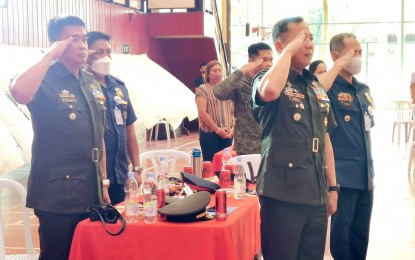 <p><strong>SALUTE</strong>. Military and police commanders honor World War II veterans in Negros Oriental during a recognition ceremony in Dumaguete City on Friday (Dec. 2, 2022). Defense Senior Undersecretary Jose Faustino Jr., who attended the activity, commanded the efforts of the uniformed men in Negros Island for the accomplishments in the fight to end the communist insurgency.<em> (PNA photo by Judy Flores Partlow)</em></p>