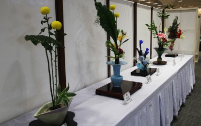 <p><strong>FLORAL ART.</strong> The ikebana floral arrangements by members of the Ikenobo Ikebana Society of Manila are on display at SM Aura in Taguig City on Friday (Dec. 2, 2022). The centuries-old ikebana is a refined art that places much reverence on plants removed from nature and brings new life to it. <em>(PNA photo by Jesus Escaros)</em></p>