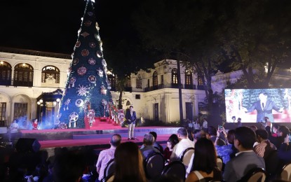 <p><strong>‘SIMBANG GABI’.</strong> President Ferdinand R. Marcos Jr. delivers his speech during the Christmas tree lighting ceremony at the Kalayaan Grounds in Malacañan Palace on Saturday (Dec. 3, 2022). The President has opened Malacañan Palace to the public for the traditional Simbang Gabi (dawn masses) that will be held at 4:30 a.m. in front of Mabini Hall. Attendees can enter through Gate 6 directly in front of Kalayaan Hall. <em>(PNA photo by Alfred Frias)</em></p>