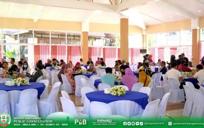 <p><strong>PRIORITY CODES.</strong> Stakeholders in Basilan wait for the start of public consultations on the proposed local governance and electoral codes in the Bangsamoro Autonomous Region in Muslim Mindanao on Monday (Dec. 5, 2022).  The same consultations commenced on the same day in the provinces of Lamitan and Sulu.<em> (Photo courtesy of BTA-BARMM)</em></p>