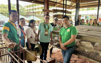 <p><strong>FARM SCHOOL</strong>. Department of Education Western Visayas Regional Director Dr. Ramir B. Uytico (4th from left) visits the Jayobo Farm School at the Jayobo National High School in Lambunao, Iloilo on Dec. 3, 2022. DepEd Western Visayas takes pride in having pioneered the implementation of the DepEd-run farm schools in the country. <em>(Photo from Ramir B. Uytico FB page)</em></p>