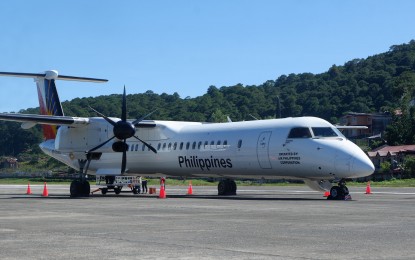 <p><strong>ALL SYSTEMS GO.</strong> After almost 30 years of hiatus, it’s all systems go for the resumption of flights at the Loakan Airport in Baguio City after the successful test flight last Nov. 28, 2022 of Philippine Airlines’ (PAL) De Havilland Dash 8 Series 400 Next Generation aircraft (in photo). The four-times-a-week direct flight from Cebu to Baguio and Baguio to Cebu will start on Dec. 16, 2022, and will link two of the Philippines' key tourist and business destinations. <em>(PNA photo courtesy of PIO-Baguio)</em></p>