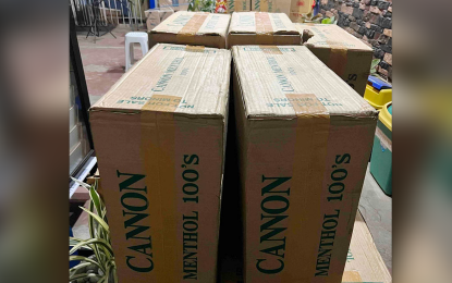 <p><strong>SMUGGLED CIGARETTES.</strong> Police officers seize some PHP3 million worth of smuggled cigarettes Tuesday (Dec. 6, 2022) near a shipyard in Barangay Cawit, Zamboanga City. No one was arrested as the supposed owner and workers hauling the contraband fled upon sensing the arrival of police officers.<em> (Photo courtesy of ZCPO)</em></p>