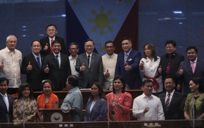 <p><strong>CONFIRMED.</strong> Members of the Commission on Appointments pose for a photo with confirmed Cabinet officials -- Department of Information and Communications Technology Secretary Ivan John Uy (center), Department of Energy Secretary Raphael Lotilla (center left), and Department of Science and Technology Secretary Renato Solidum Jr. (center right). (<em>PNA photo by Avito Dalan)</em></p>