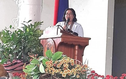 <p><strong>BEST COFFEE.</strong> Jennilyn Dawayan, regional technical director for research and regulations of the Department of Agriculture-Cordillera urges locals to boost coffee production during the opening of the 5th La Trinidad Coffee Festival on Thursday (Dec. 8, 2022). While the Cordilleras produce the best Arabica coffee in the country, the Philippines imports about 70 percent of its coffee supply. <em>(PNA photo by Aida Pagtan)</em></p>